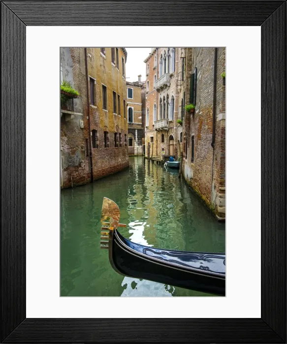 Framed Print : Venice, Veneto, Italy. Gondola sailing through a street canal Framed Print : Venice, Veneto, Italy. Gondola sailing through a street canal