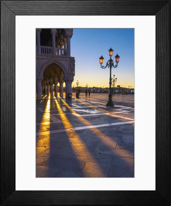 Framed Print : St Mark square, Venice, Veneto, Italy. Sun rays at sunrise through the arches of Palazzo Framed Print : St Mark square, Venice, Veneto, Italy. Sun rays at sunrise through the arches of Palazzo