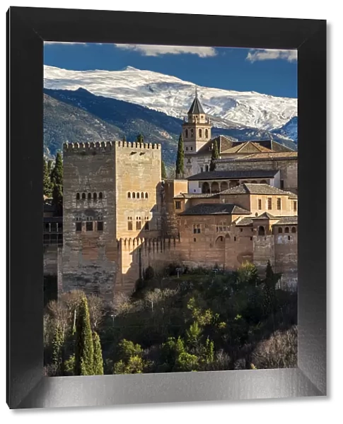 Alhambra palace with the snowy Sierra Nevada in the background, Granada, Andalusia, Spain