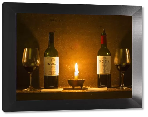 Spain, La Rioja, Haro. Wine arrangement in the caves at Bodegas Roda