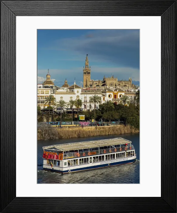 Framed Print : River Guadalquivir with Cathedral and Giralda bell tower in the background, Seville Framed Print : River Guadalquivir with Cathedral and Giralda bell tower in the background, Seville
