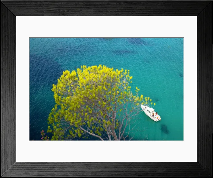 Framed Print : View of Cala Galdana and sailboat, Menorca; Balearic Islands; Spain; Europe Framed Print : View of Cala Galdana and sailboat, Menorca; Balearic Islands; Spain; Europe