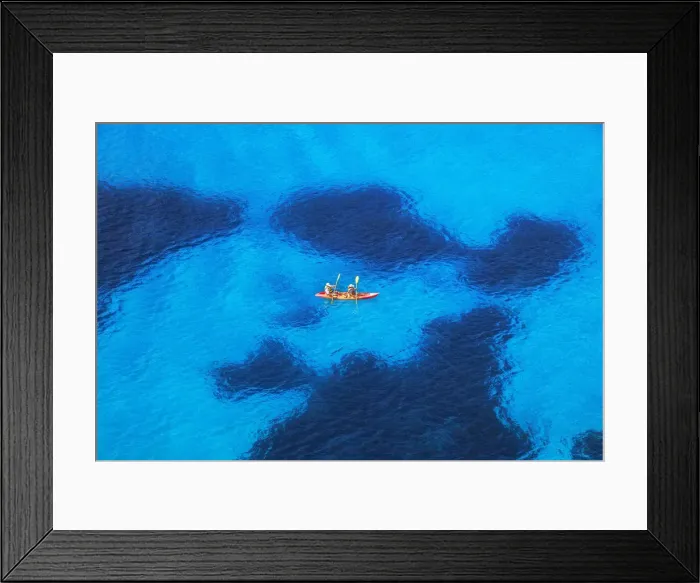 Framed Print : People canoeing near Cala Mitjana, Menorca; Balearic Islands; Spain; Europe Framed Print : People canoeing near Cala Mitjana, Menorca; Balearic Islands; Spain; Europe