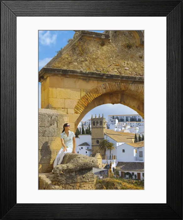 Framed Print : Spain, Andalucia, Malaga Province, Ronda, Felipe V Gate, Woman sitting besite gate (MR) Framed Print : Spain, Andalucia, Malaga Province, Ronda, Felipe V Gate, Woman sitting besite gate (MR)