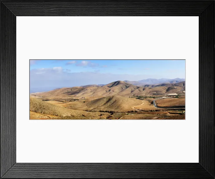 Framed Print : The ancient volcanic landscape of Fuerteventura, Canary islands Framed Print : The ancient volcanic landscape of Fuerteventura, Canary islands