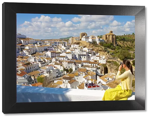 Spain, Andalucia, Setenil, Woman photographing view (MR)