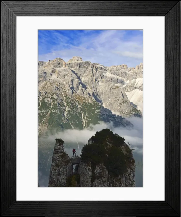 Framed Print : Climber on a rock tower of the Croda Rossa overlooking the Dreischusterspitze, Alta Framed Print : Climber on a rock tower of the Croda Rossa overlooking the Dreischusterspitze, Alta