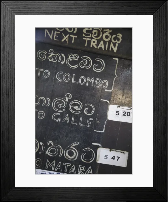 Framed Print : Train timetable at Weligama station, Weligama, Southern Province, Sri Lanka Framed Print : Train timetable at Weligama station, Weligama, Southern Province, Sri Lanka
