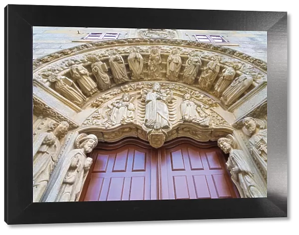 Spain, Galicia, Santiago de Compostela, decorative arch and doorway at church