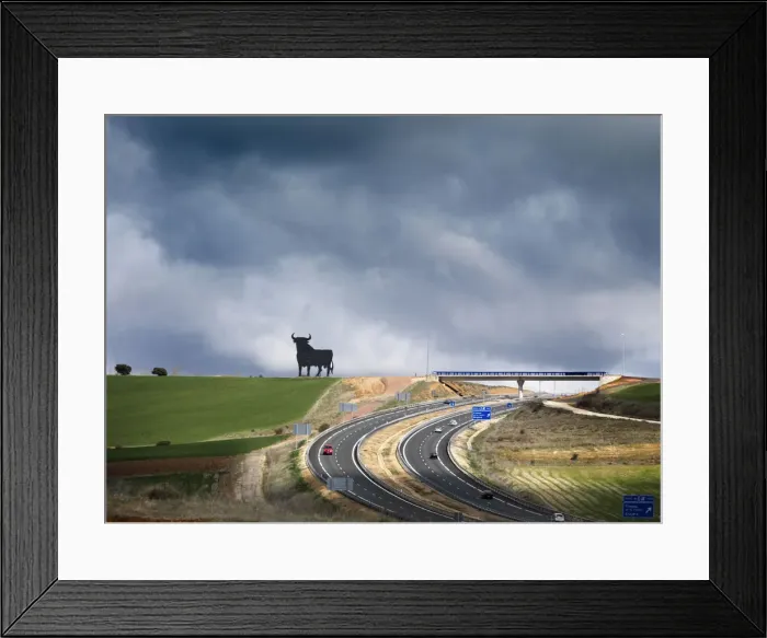 Framed Print : Spain, Castile and Leon, Segovia, Bull silhouette, classic symbol on the roads of Spain Framed Print : Spain, Castile and Leon, Segovia, Bull silhouette, classic symbol on the roads of Spain