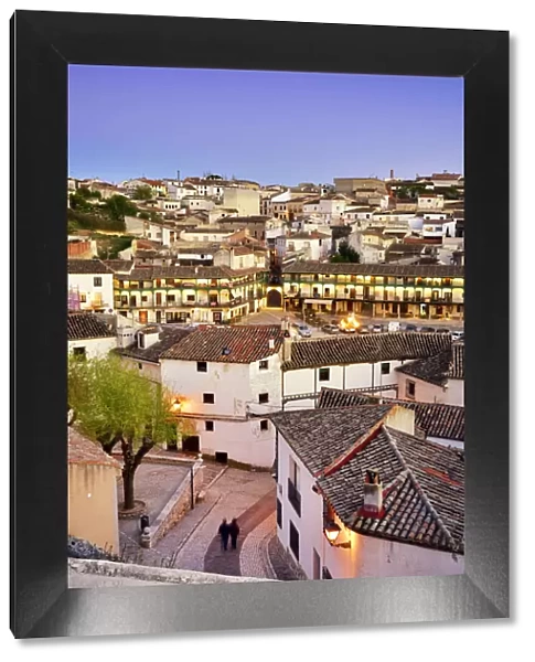 The old town of Chinchon with the 15-17th century Plaza Mayor at dusk. Castilla la Mancha