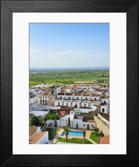 Framed Print : The white washed village of Olivenza with Portugal on the horizon