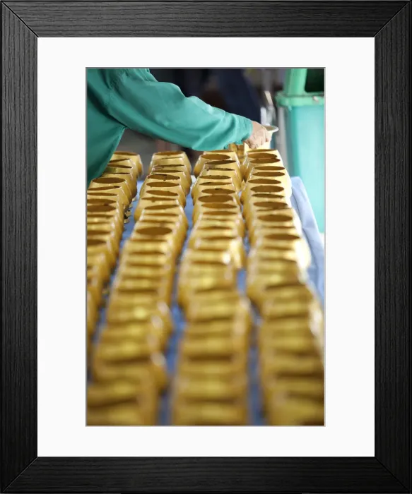 Framed Print : Bangkok, Thailand. A hand dropping a coin into an alms bowl on a altar in a buddhist Framed Print : Bangkok, Thailand. A hand dropping a coin into an alms bowl on a altar in a buddhist