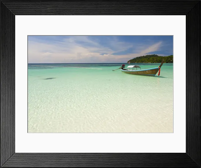 Framed Print : Thailand, Satun Province, Koh Lipe. A boat moored off Pattaya Beach