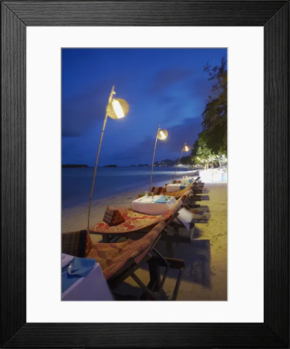 Framed Print : Tables set for dinner at Amari Palm Reef on Chaweng beach at dusk, Ko Samui, Thailand