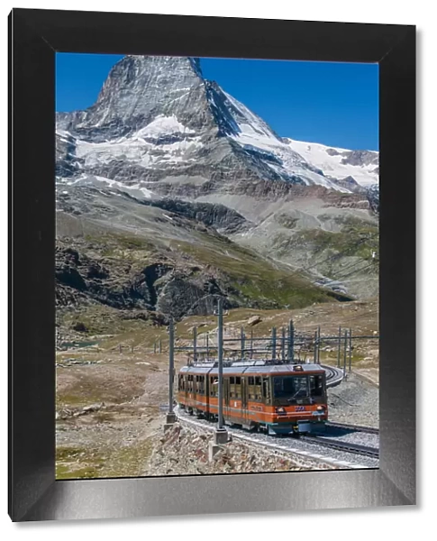 A train of the Gornergratbahn rack railway with Matterhorn behind, Zermatt, Valais