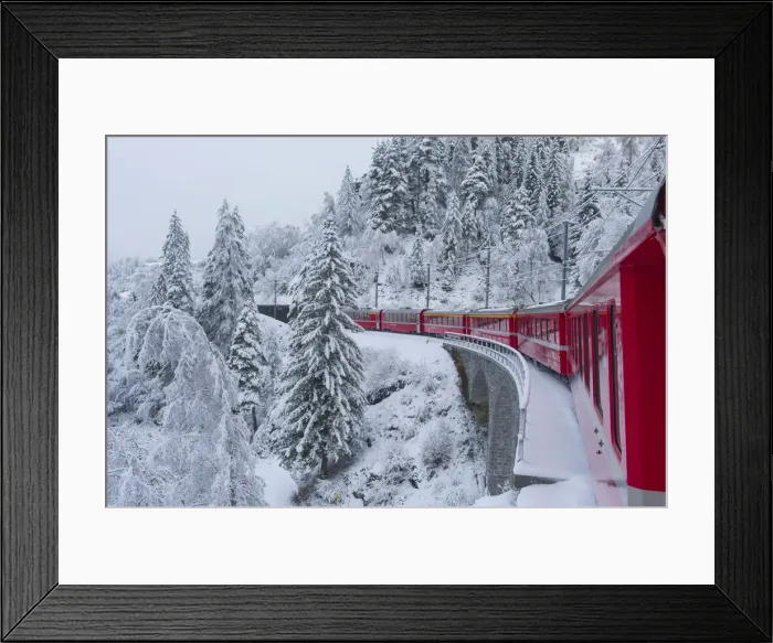Framed Print : Iconic swiss red Bernina Express train in winter landscape and pristine snow. Swizerland Framed Print : Iconic swiss red Bernina Express train in winter landscape and pristine snow. Swizerland