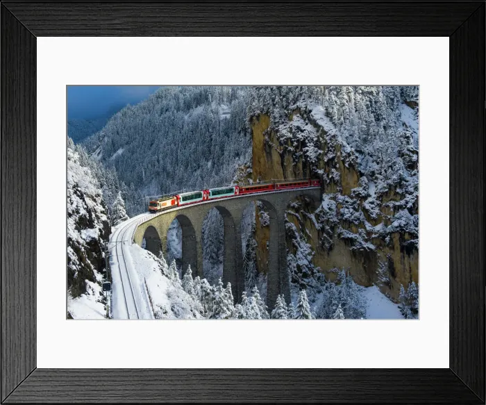 Framed Print : Iconic swiss red Bernina Express train in winter landscape and pristine snow. Swizerland Framed Print : Iconic swiss red Bernina Express train in winter landscape and pristine snow. Swizerland
