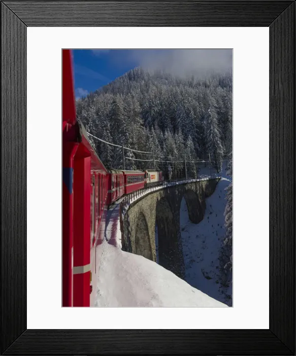Framed Print : Iconic swiss red Bernina Express train in winter landscape and pristine snow. Swizerland Framed Print : Iconic swiss red Bernina Express train in winter landscape and pristine snow. Swizerland