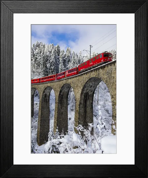 Framed Print : Iconic swiss red Bernina Express train in winter landscape and pristine snow. Swizerland Framed Print : Iconic swiss red Bernina Express train in winter landscape and pristine snow. Swizerland