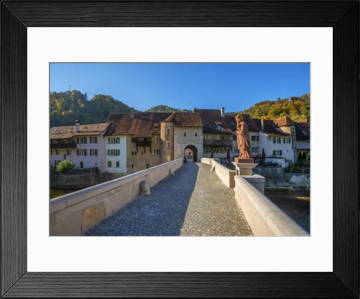 Framed Print : Bridge over river Doubs at St. Ursanne, Jura, Switzerland Framed Print : Bridge over river Doubs at St. Ursanne, Jura, Switzerland