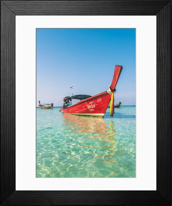 Framed Print : Ko Lipe, Satun Province, Thailand. Red wooden long tail boat on turquoise water