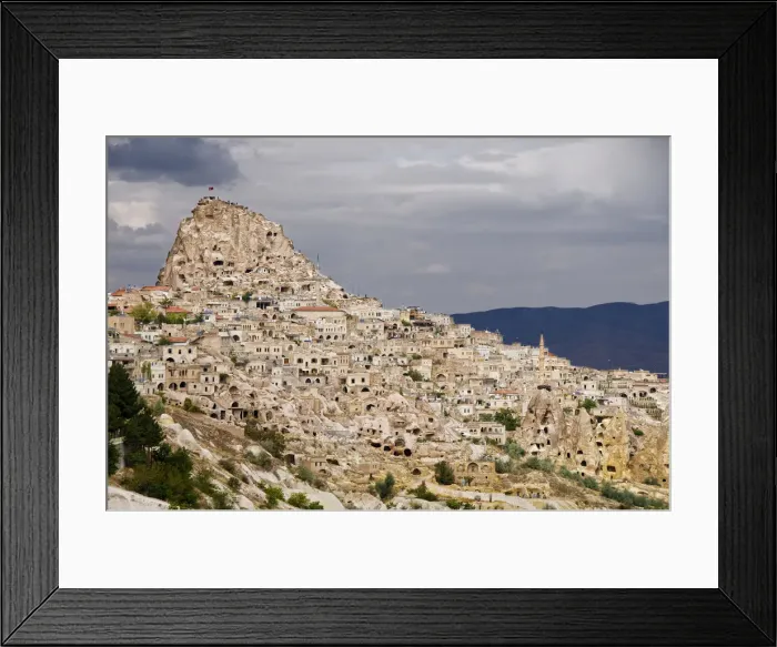 Framed Print : The rocky village of Uchisar, above the old Silk Road plains of Cappadocia. Turkey, Asia