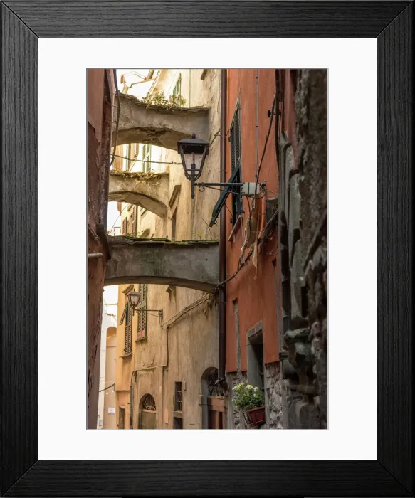 Framed Print : Italy, Tuscany, narrow street with arches in Pontremoli Framed Print : Italy, Tuscany, narrow street with arches in Pontremoli