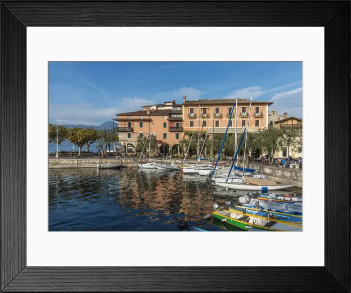 Framed Print : europe, Italy, Veneto. a sunny afternoon at Garda Lake town Torri del Benaco Framed Print : europe, Italy, Veneto. a sunny afternoon at Garda Lake town Torri del Benaco