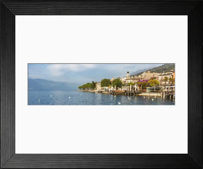 Framed Print : europe, Italy, Veneto. a sunny afternoon at Garda Lake town Torri del Benaco Framed Print : europe, Italy, Veneto. a sunny afternoon at Garda Lake town Torri del Benaco