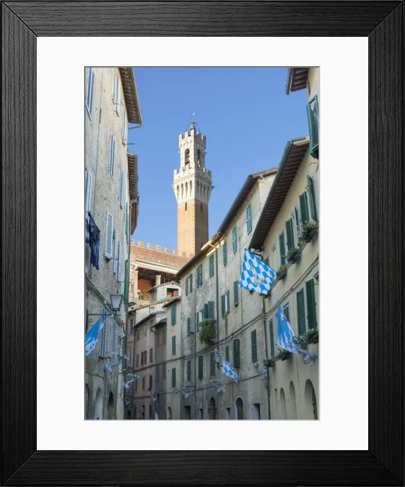 Framed Print : Mangias tower and street with Contrade flags of Onda, Siena, Tuscany, Italy