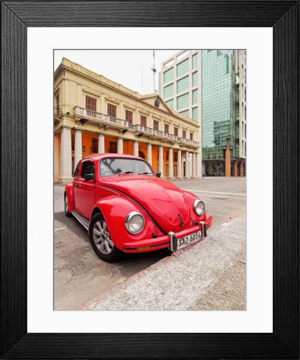 Framed Print : Uruguay, Montevideo, Red Volkswagen Beetle parked in front of the Estevez Palace