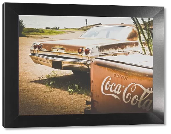 USA, Route 66, details of an old rugged Coca Cola fridge and car, vintage processing