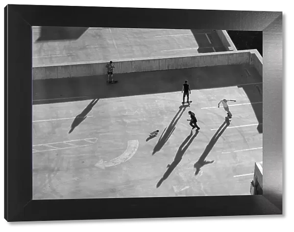 USA, Nevada, Reno, kids in Reno roller skating on parking garage roof
