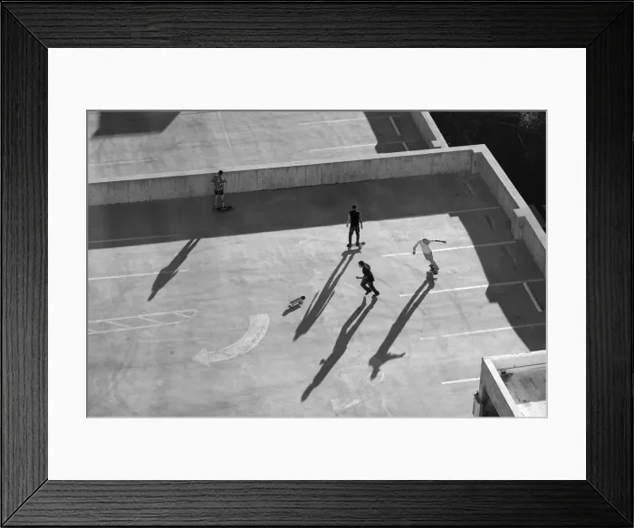 Framed Print : USA, Nevada, Reno, kids in Reno roller skating on parking garage roof Framed Print : USA, Nevada, Reno, kids in Reno roller skating on parking garage roof