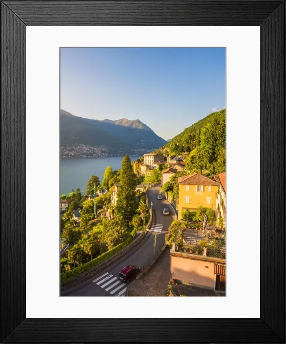 Framed Print : Blevio, lake Como, Como province, Lombardy, Italy. The winding coastal road at sunset Framed Print : Blevio, lake Como, Como province, Lombardy, Italy. The winding coastal road at sunset