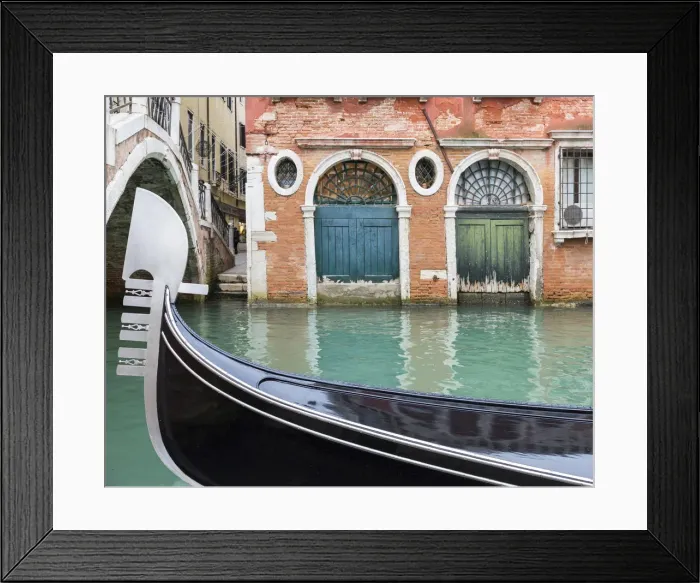 Framed Print : Gondola passes two old doors on canal, Venice, Veneto, Italy Framed Print : Gondola passes two old doors on canal, Venice, Veneto, Italy