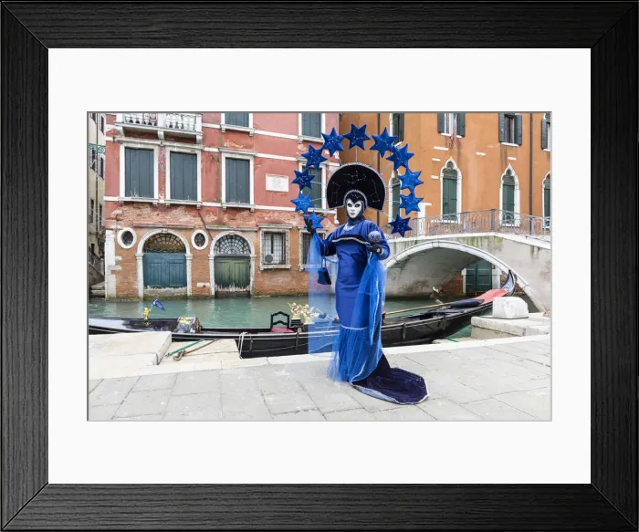 Framed Print : Woman in blue costume posing by canal during Carnival, Venice, Veneto, Italy Framed Print : Woman in blue costume posing by canal during Carnival, Venice, Veneto, Italy