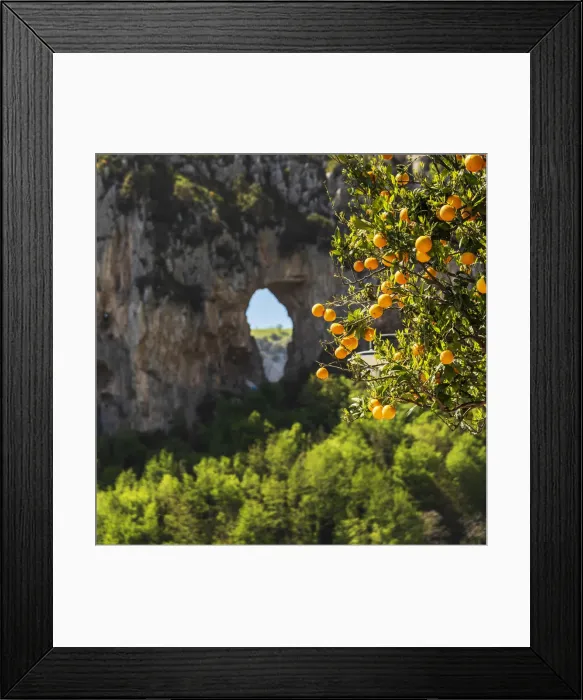 Framed Print : Europe, Italy, Campania. An orange tree in front of a rock with a hole near to Positano Framed Print : Europe, Italy, Campania. An orange tree in front of a rock with a hole near to Positano