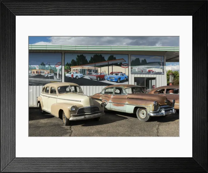 Framed Print : USA, Colorado, Delta County, Delta, Rusty cars parked outside shop Framed Print : USA, Colorado, Delta County, Delta, Rusty cars parked outside shop