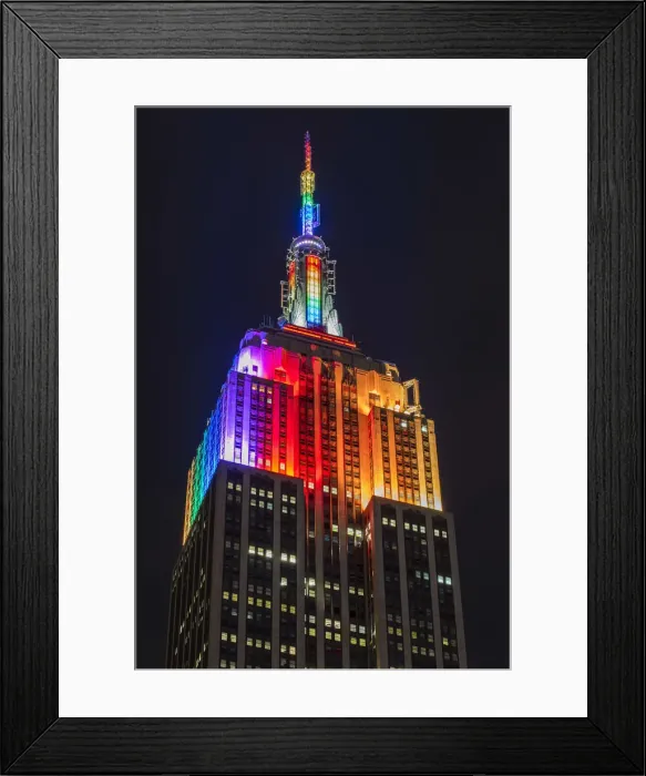 Framed Print : Night low angle view of the Empire State Building with rainbow colors, Manhattan Framed Print : Night low angle view of the Empire State Building with rainbow colors, Manhattan