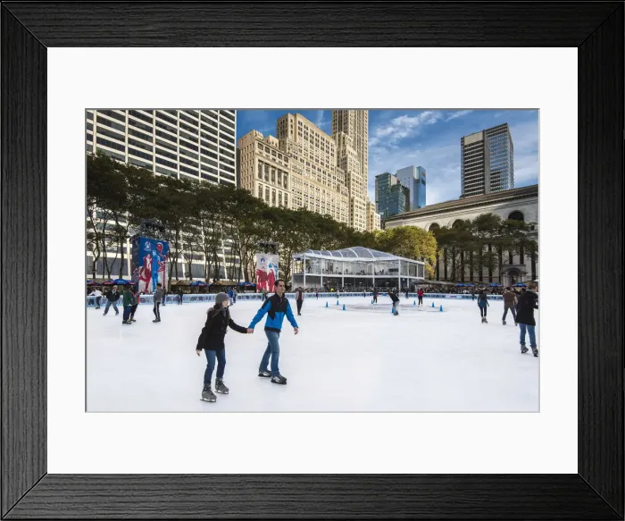 Framed Print : Ice skating in Bryant Park, Manhattan, New York, USA Framed Print : Ice skating in Bryant Park, Manhattan, New York, USA