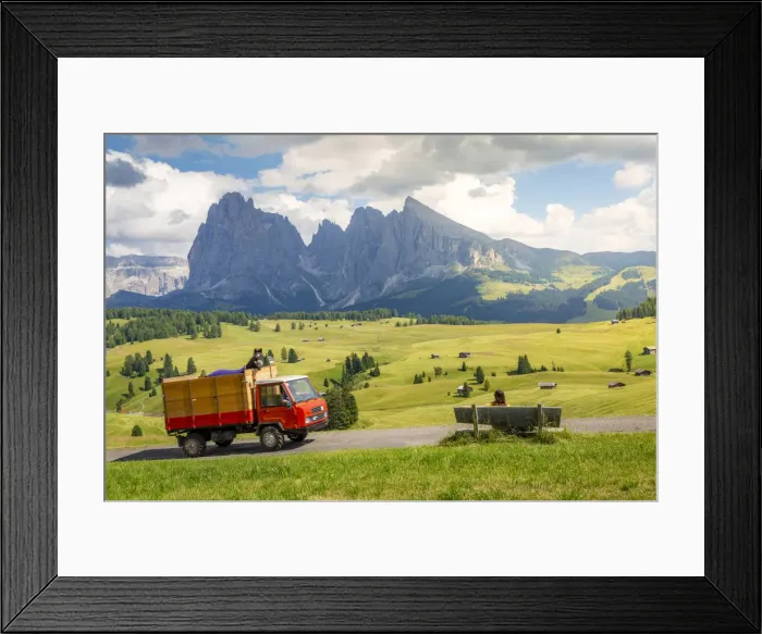 Framed Print : Siusi, Dolomites Alps, Italy. bench with tourist and horse on a truck, sunny summer day Framed Print : Siusi, Dolomites Alps, Italy. bench with tourist and horse on a truck, sunny summer day