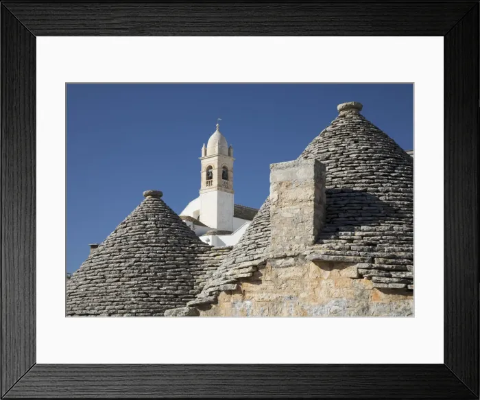 Framed Print : Italy, Apulia (Puglia), Bari district, Itria Valley, traditional trulli rooftops Framed Print : Italy, Apulia (Puglia), Bari district, Itria Valley, traditional trulli rooftops