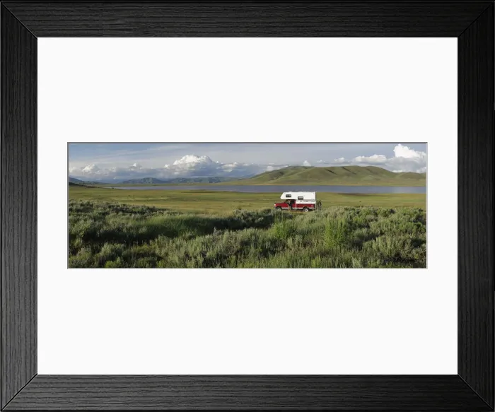Framed Print : Woman standing next to her pick up camper, Little Camas Prarie Reservoir, Boise National Framed Print : Woman standing next to her pick up camper, Little Camas Prarie Reservoir, Boise National