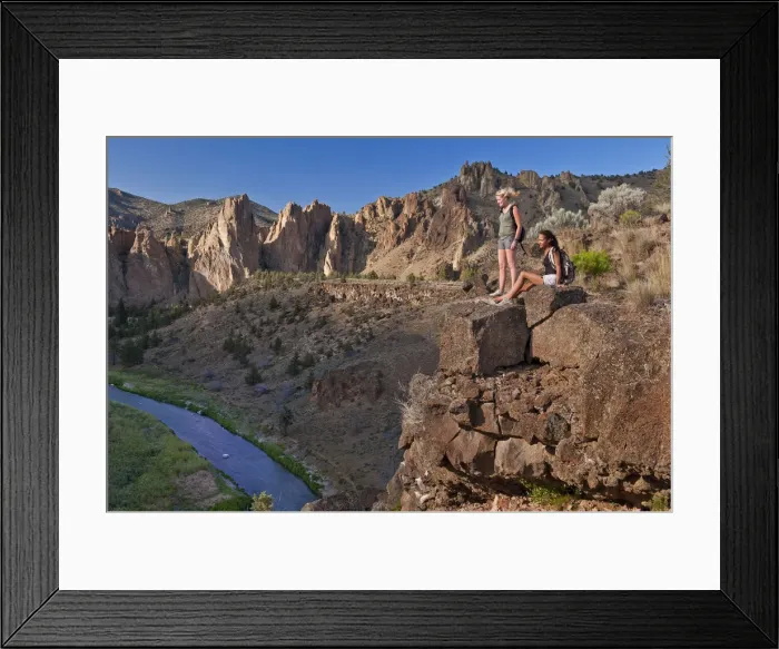 Framed Print : Two girls resting on cliff face, Smith Rock State Park, Central Oregon, USA MR