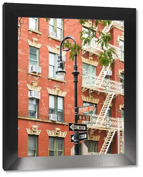 Street lamp and fire escapes in Greenwich village, New York, USA