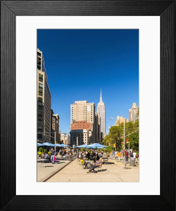 Framed Print : Enjoying the sun in the Flatiron Plaza, New York, USA Framed Print : Enjoying the sun in the Flatiron Plaza, New York, USA