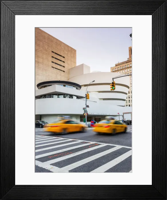 Framed Print : Taxis passing the Solomon R Guggenheim Museum, New York, USA Framed Print : Taxis passing the Solomon R Guggenheim Museum, New York, USA