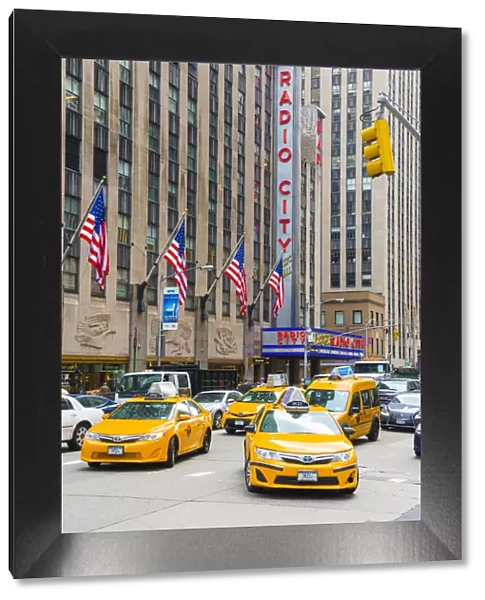 Taxi cabs outside Radio city, New York, USA
